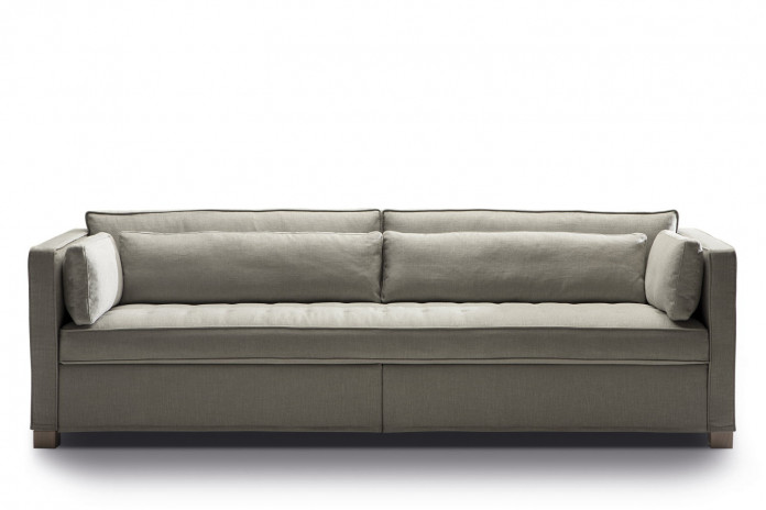 Scandinavian inspired 3-seater sofa with a tufted single-cushion seat