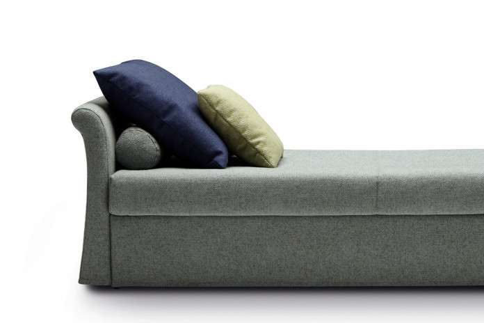 Roll cushion combined with decorative cushions for the sofa