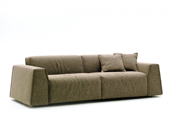 Contemporary low 2-3 seater sofa with wide wedge arms