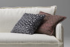 Cushion with inverted seam edges (on the right)