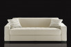 Matrix sofa bed with a square quilted one-piece seat cushion.