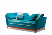 Designers Guild blue velvet and a bold coral painted plinth