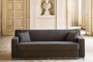 A bench style one-cushion sofa and minimalist slope arms for a timeless piece