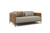 Side view of the 2 seater dual tone sofa bed with decorative cushion