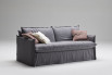 Contemporary 2-3 seater skirted sofa with deep single-cushioned seat