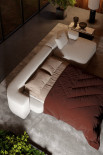 Top view of the L-shaped sofa with the bed open