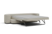 The bed is opened by pulling it out from beneath the seat
