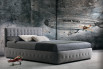 Contemporary upholstered bed with buttonless tufted headboard and frame