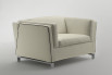Stylish contemporary square armchair with high shelter arms