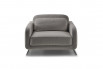 Ski leg armchair bed with narrow arms and comfortable seat and back cushions