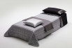Single bed with slatted base and foam mattress