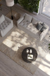 Small sofa bed with quilted seat and matching armchair